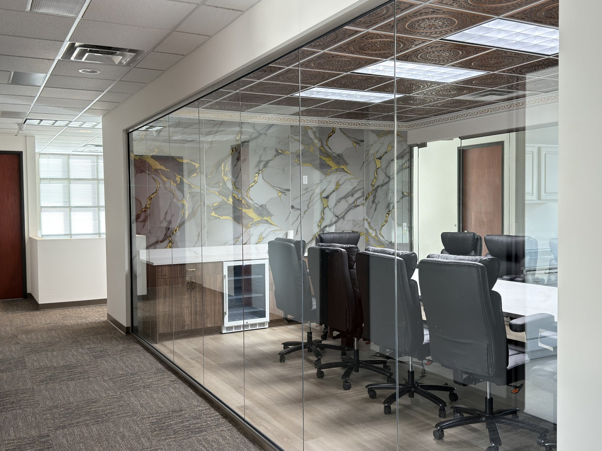 Modern office conference room with glass walls and a meeting table without window film