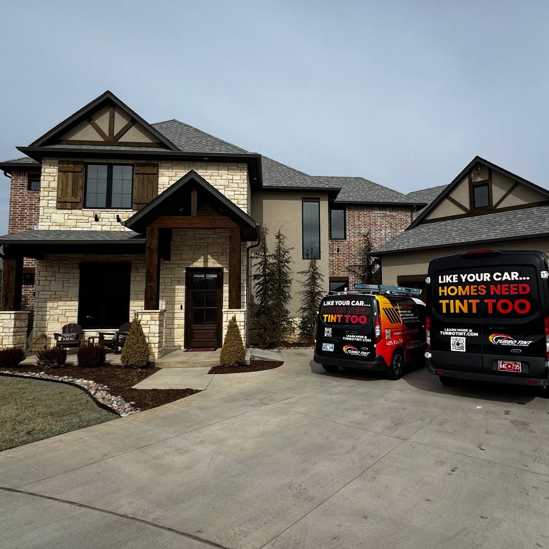 Turbo Tint architectural vehicles infront of a newly tinted home 