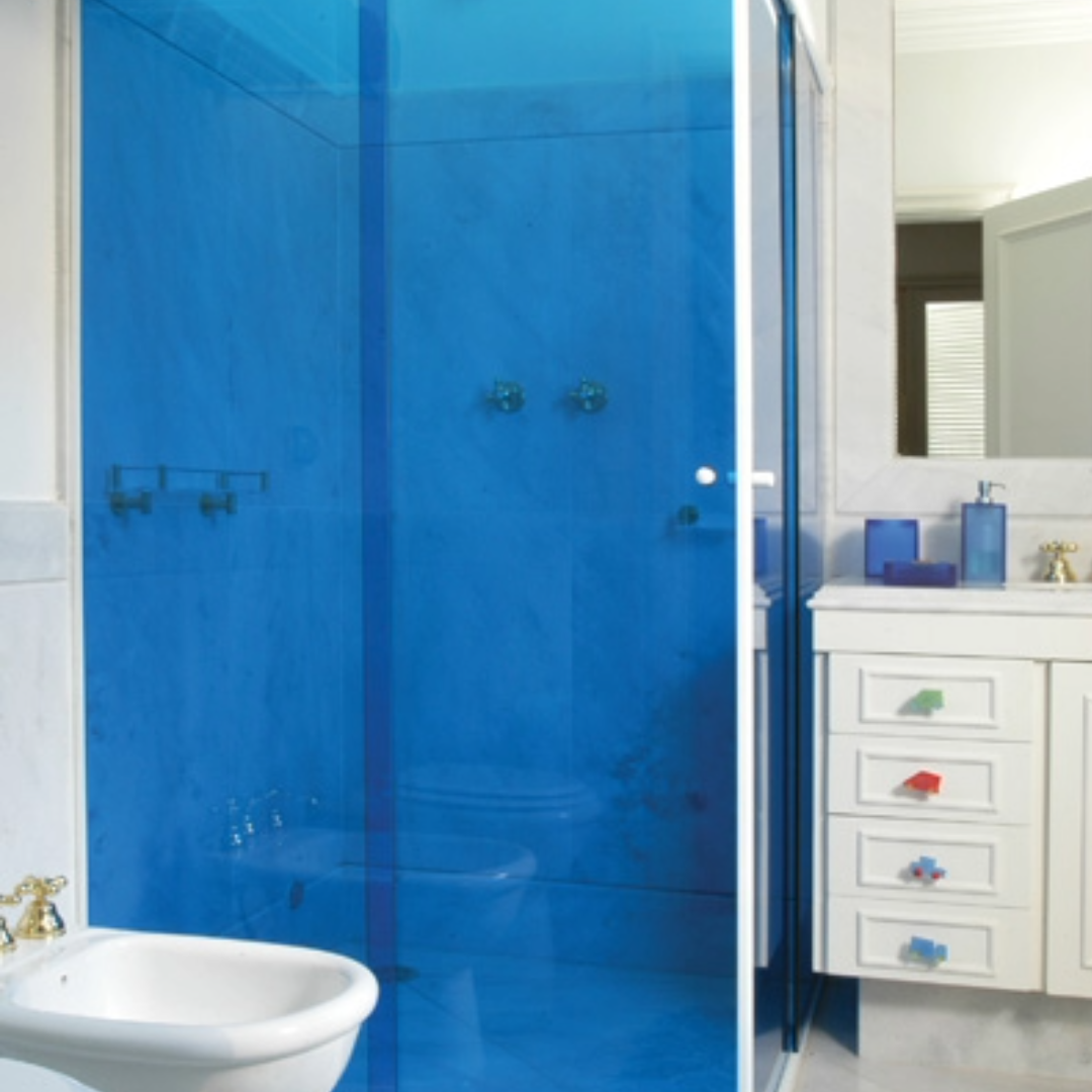 Bathroom with a blue shower window film installation for style